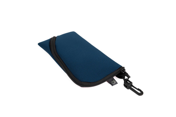 A Small Ghost Whale Pouch in Deep Blue (dark blue).